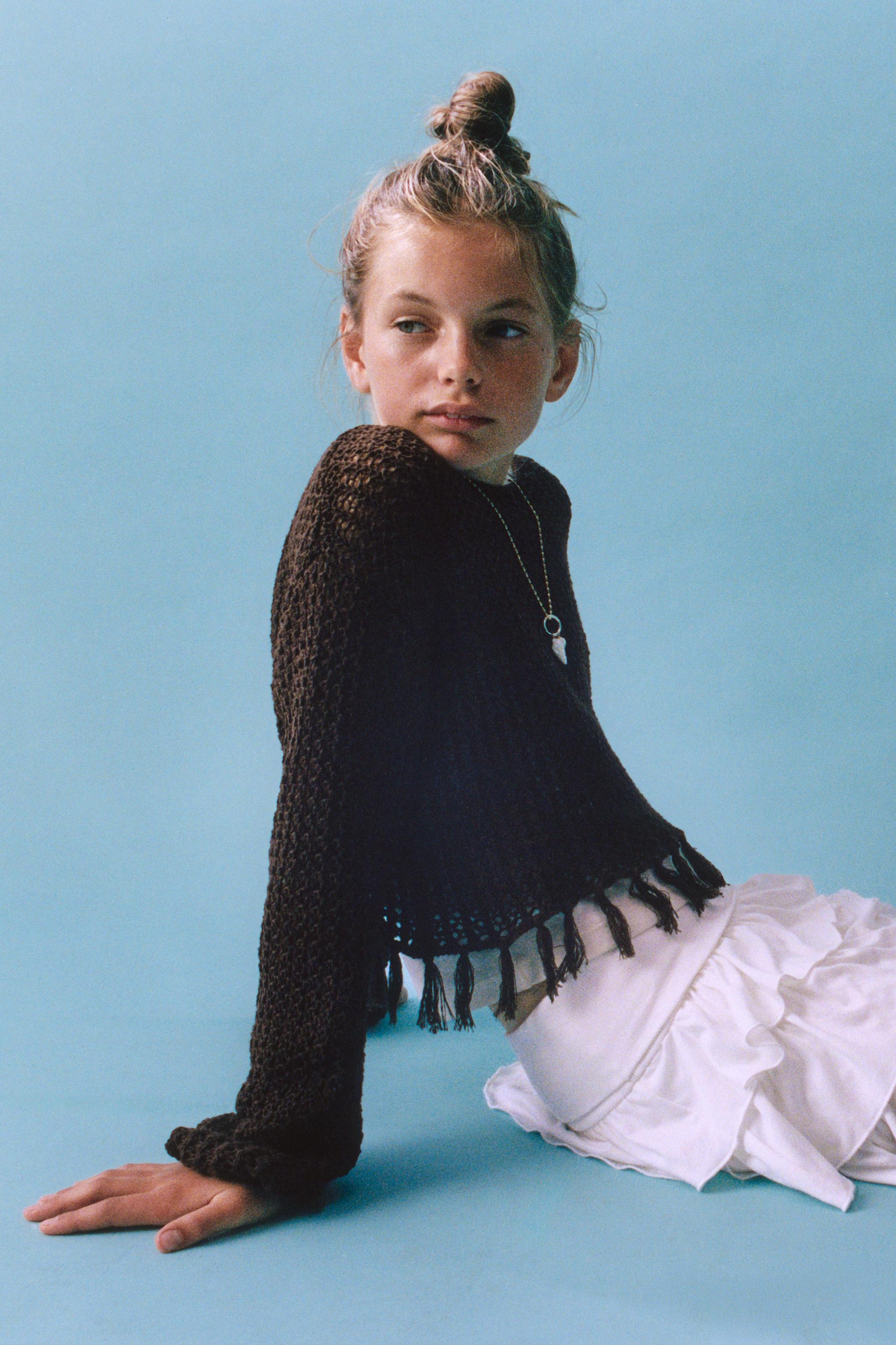 PULL EN MAILLE À FRANGES